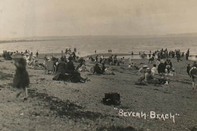 Deck chairs and picnics - people enjoy the water at Severn Beach during its heyday