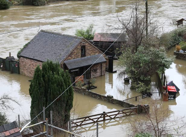 <p>Houses in Ironbridge surrounded by flood waters as River Severn levels started to rise following heavy rain.</p>