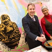 Metro Mayor Dan Norris cooks a traditional Indian dish with Tiffins owner Jay Jethwa