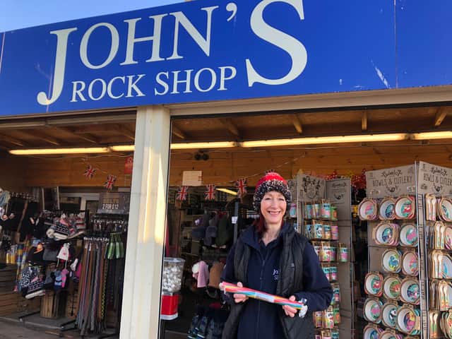Victoria with Weston-super-Mare sticks of rock on sale at John’s Rock Shop on the seafront