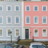 The pastel-coloured homes are Grade II-listed and brighten up the shore of Bristol’s harbourside