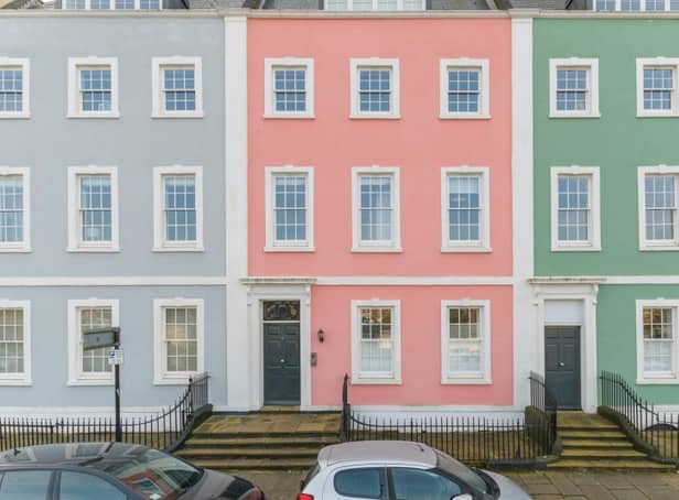 The pastel-coloured homes are Grade II-listed and brighten up the shore of Bristol’s harbourside
