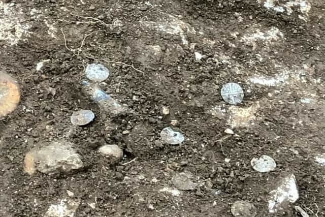 The coins where they were found.