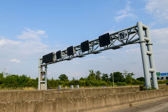 Smart motorways rely on cameras and overhead signs to monitor and control traffic on roads with no hard shoulder