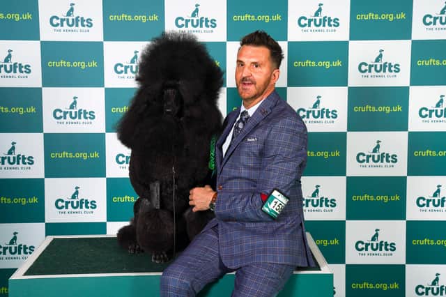 Philip Langdon poses with Jake after winning Best of Breed at Crufts 2023