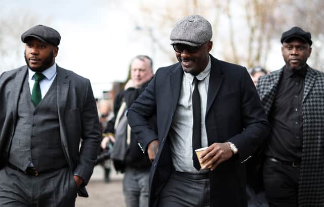 Actor and DJ Idris Elba arrives with friends for the big day