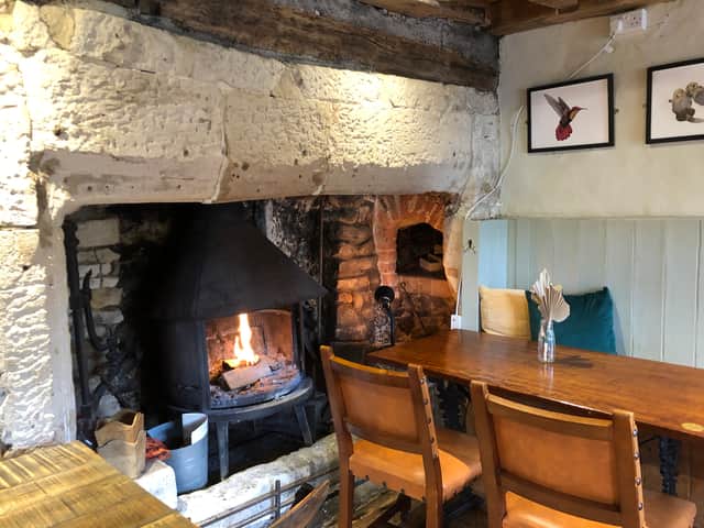 The cosy real fire at the Cross Guns, which attracts walkers, cyclists and tourists (photo: Mark Taylor)