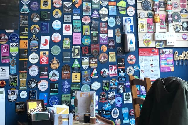 One wall is plastered with pump clips from past beers served at the pub (photo: Mark Taylor)