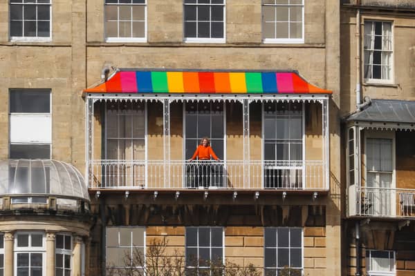Illona Aylmer out on her balcony with the colourful canopy - but there have been several complaints