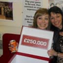 Tegen Roberts (left) with the winning £250,000 box she picked in Deal or No Deal