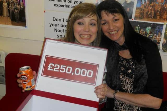 Tegen Roberts (left) with the winning £250,000 box she picked in Deal or No Deal