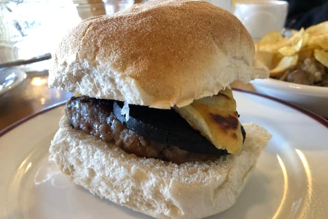 The square sausage, black pudding and tattie scone sandwich is one breakfast option at Lucky Strike