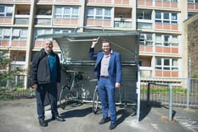 Councillor Donald Alexander and Councillor Tom Renhard with a new cycle hanger in front of Waring House in Redcliffe (photo: Bristol City Council)