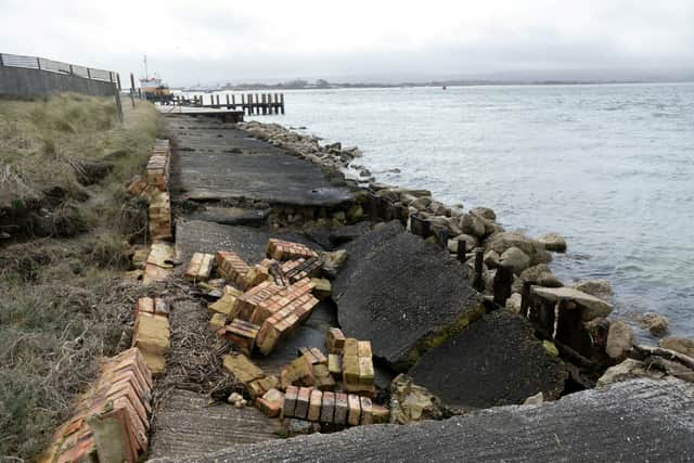 The property’s collapsed tidal defence.