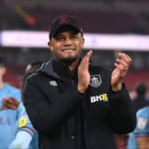 Vincent Kompany celebrates promotion following Burnley’s match with Middlesbrough in early April.