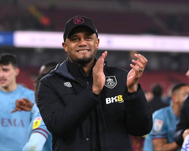 Vincent Kompany celebrates promotion following Burnley’s match with Middlesbrough in early April.