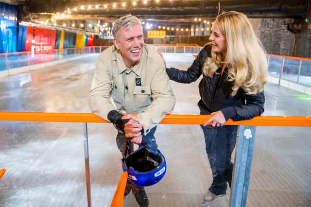 Bez and his winning partner Angela Egan take a break after being the first to skate on the ice during homecoming Manchester ice skate, a practice session for "Dancing On Ice" on the new ice skating rink at Escape to Freight Island on November 12, 2021 in Manchester, England. (Photo by Anthony Devlin/Getty Images)