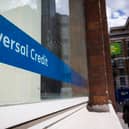  A Universal Credit sign in the window of the Job Centre in Westminster.