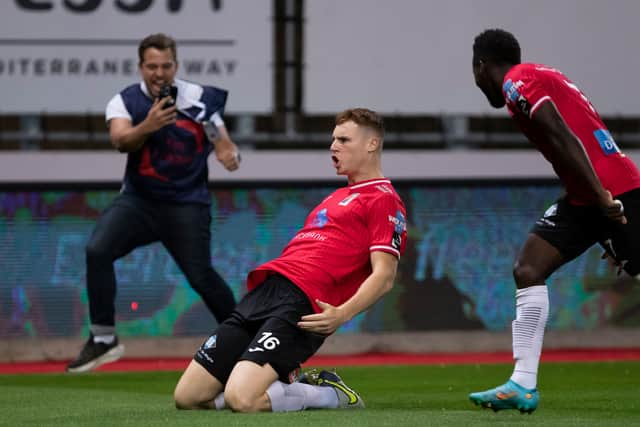 Jake O’Brien celebrates scoring a goal for RWD Molenbeek