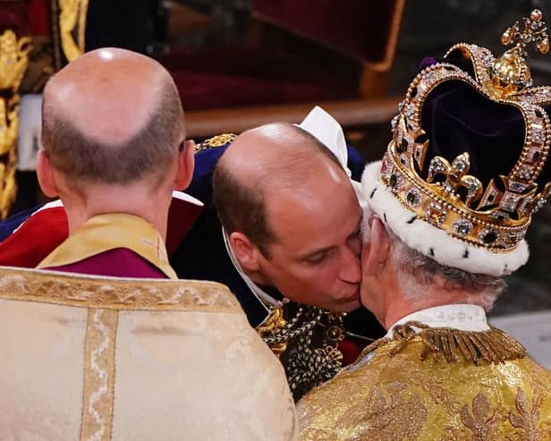  Prince William kisses his father, Britain’s King Charles III as he pays homage (Photo: Getty Images)