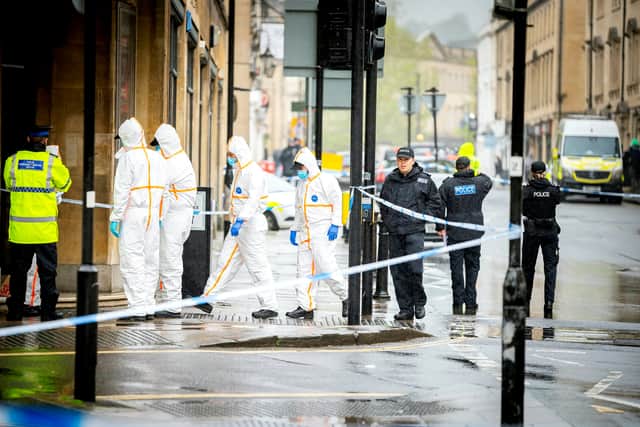 Police sealed off a large area in Bath city centre for the investigation after a man died