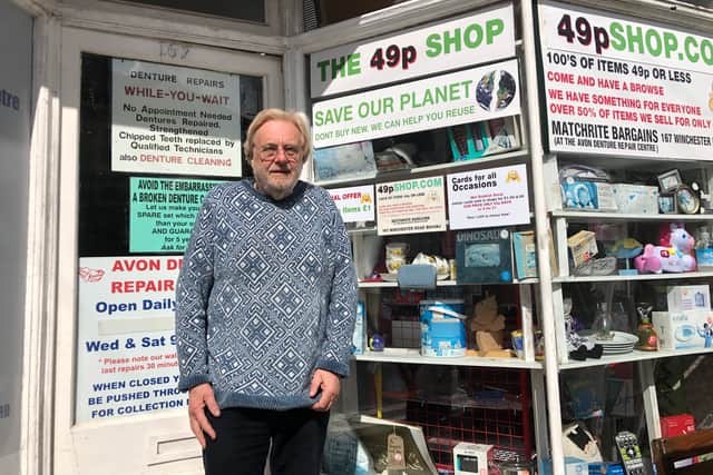 Andrew Mulcahy outside his bargain shop and denture repair centre