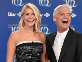 Holly Willoughby (left) and Phillip Schofield (right) put up a united front in Monday's episode of This Morning after rumours of a bitter feud between the hosting duo - Credit: Getty