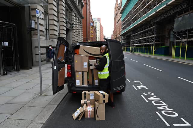 Amazon is offering a joining bonus of £3,000 to some seasonal warehouse staff (image: AFP/Getty Images)