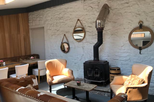 The woodburner keeps customers warm in winter at The George Inn