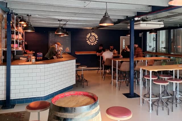 Inside the Hop Union Brewery where workers enjoy a pint after work on a Friday