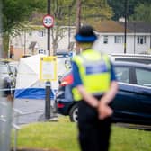 Police at the scene of the alleged murder of a 16-year-old in Bath