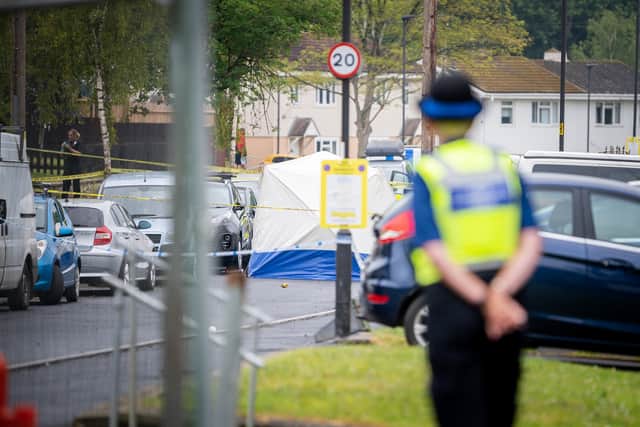Police at the scene of the alleged murder of a 16-year-old in Bath