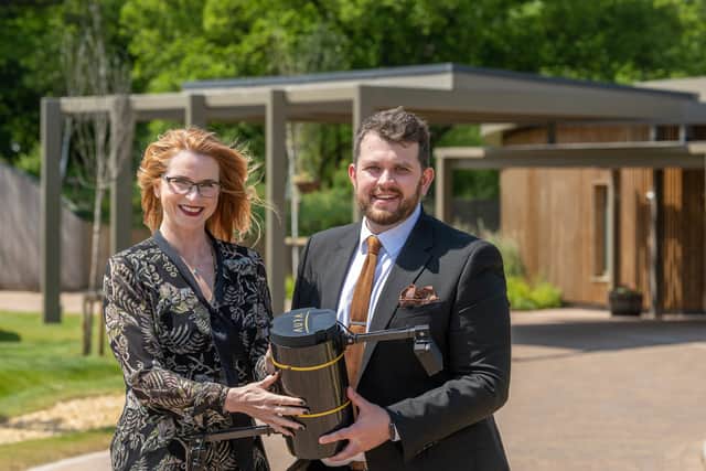 Samantha Richardson of Aura Flights and Matthew Brook of Westerleigh Group with the scatter vessel