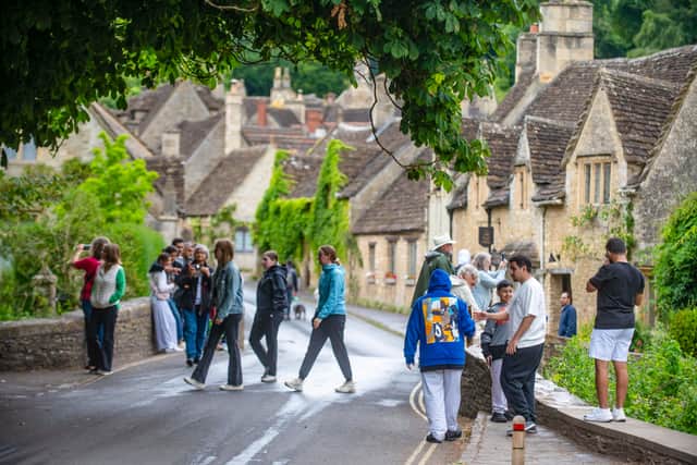 Castle Combe in Wiltshire attracts thousands of tourists each year - but that comes with problems, say locals