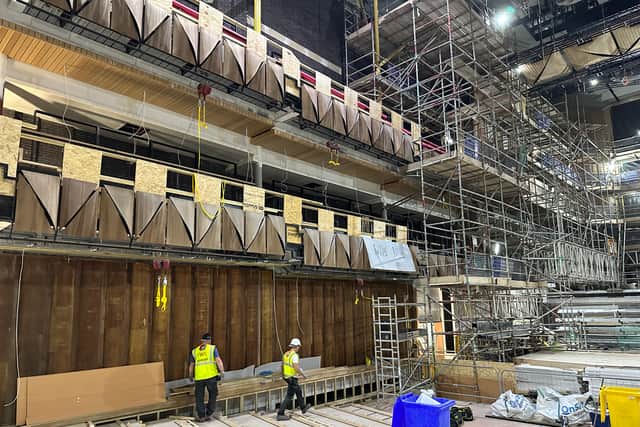Work takes place in the Beacon Hall ahead of seating being installed