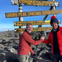 Alan Knight (left) with Jon Leonard at the peak of Kilimanjaro