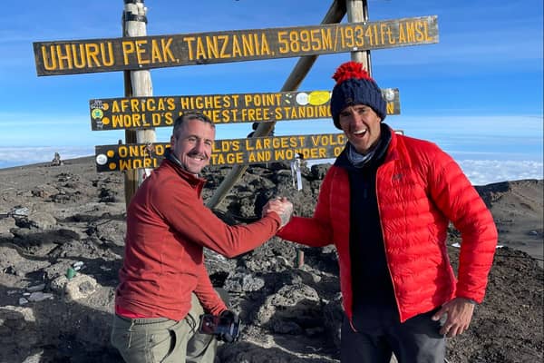 Alan Knight (left) with Jon Leonard at the peak of Kilimanjaro