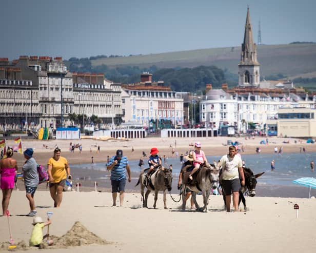Weymouth offers all the traditional seaside holiday attractions including donkeys and Punch and Judy shows