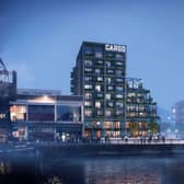 A CGI image of how the proposed Cargo building will look at night from across the harbour