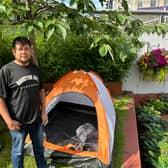 Royston Tillman outside the tent he sleeps in with his three brothers in the Bearpit in Bristol city centre