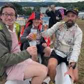 Matthew Barnes (right) literally having a mud bath with friend he’s met at Valley Fest near Bristol