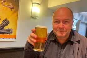 Bristol World’s Mark Taylor raises a £1.49 pint at the WG Grace on Whiteladies Road