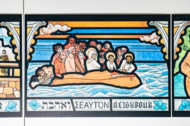 One of the deceptions of Jesus, in a boat with refugees