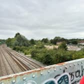 Lockleaze councillor David Wilcox looks over the bridge where Lockleaze Railway Station could be built