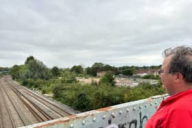 Lockleaze councillor David Wilcox looks over the bridge where Lockleaze Railway Station could be built
