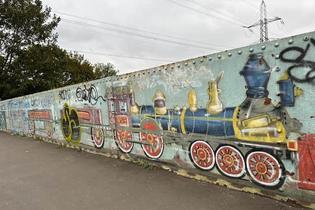 A mural on the bridge where the station could go under