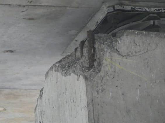 Some areas of spalling measure three metres wide, with exposed corroding reinforcement steel visible