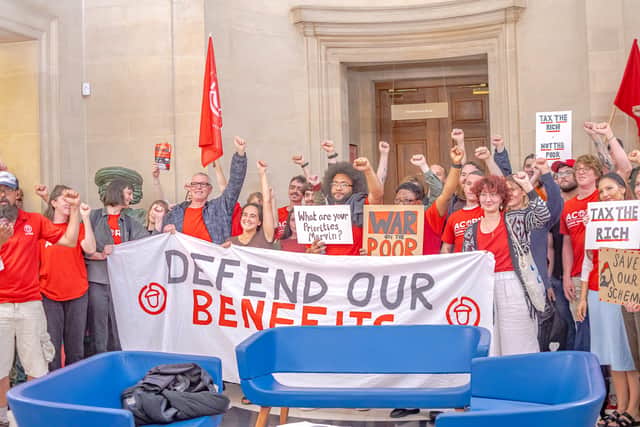 Members of ACORN inside City Hall