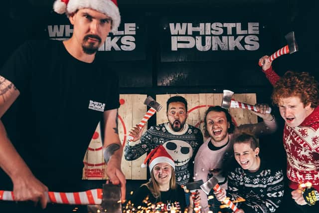 Axe throwing at Whistle Punks is one way to get into the festive spirit this year