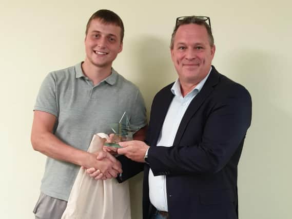 Jack Ball (left) receives his award from Simon Little, Managing Director of Best Practice Network